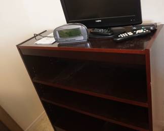 bookcase, TV, clock