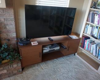 TV, TV cabinet, books