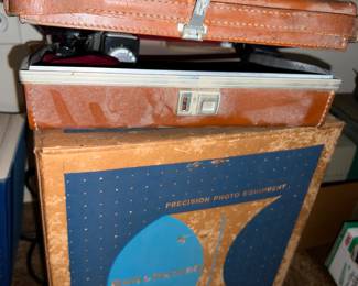 Pile of old camera accessories 