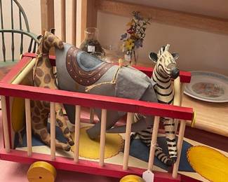 Reproduction circus wagon and painted canvas animals