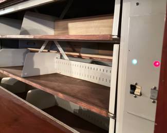 Vertical motorized carousel shelves