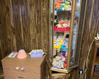 Curio case boasting bunches of Beanie Baby Bears.
