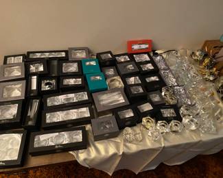 Loads of crystal. Much of it new in box.