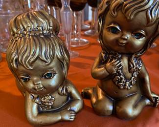 Golden hippy baby figurines.