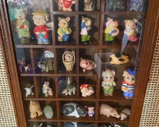 These pigs recognize they are trapped in this case. Please come free them.