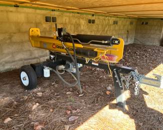 25 ton log splitter used one time. See next picture for model information