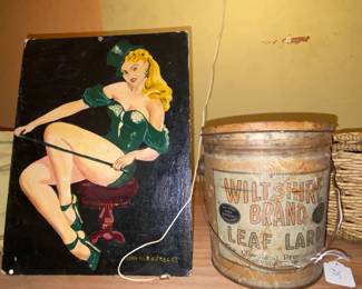 Risqué art and lard bucket