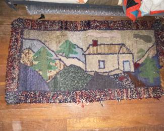Hooked rug with landscape scene 