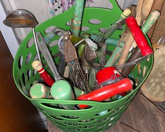 Red and green handled kitchen utensils 