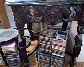 Antique table and loads of CDs