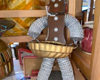 Close up folk art bottle cap  “ ashtray person”