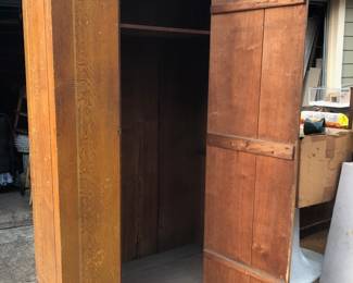 Grain painted cabinet with door open 