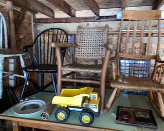 Antique chairs, large draftsman’s table ( drawers in basement), Tonka truck
