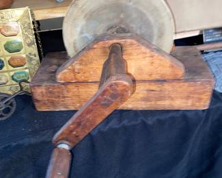 Antique wood and stone sharpening wheel