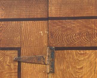 Close up of grain painted cabinet