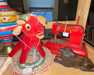 Red Bull, sewing machine , wood lion 