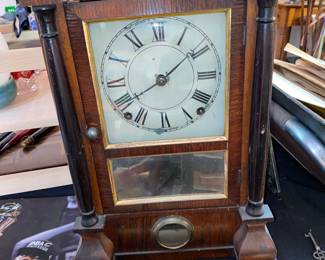 Wood cased wind up clock