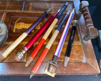 Oversized advertising pencils on an wooden inlay dog tray 