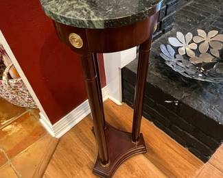 $60 Round green marble top pedestal 11x32