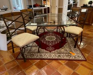 $250 Glass top rectangular table metal base 4 chairs 

