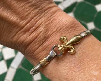 $125 -Sterling bracelet with gold fleur de lys 