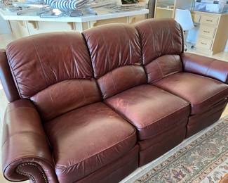 Two identical full size sofas with recliner on each end. Both are like new!!