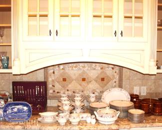 Lots of china, stemware, Pfaltzgraff and flatware.