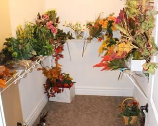 Closet is full of silk flowers and foliage.