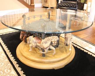 Revolving Carousel Glass Top Coffee Table.                     Glass top 44" Dia. Base 35" Dia. BUY IT NOW! $540.00.