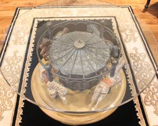 Revolving Carousel Glass Top Coffee Table.                     Glass top 44" Dia. Base 35" Dia.  BUY IT NOW! $540.00.