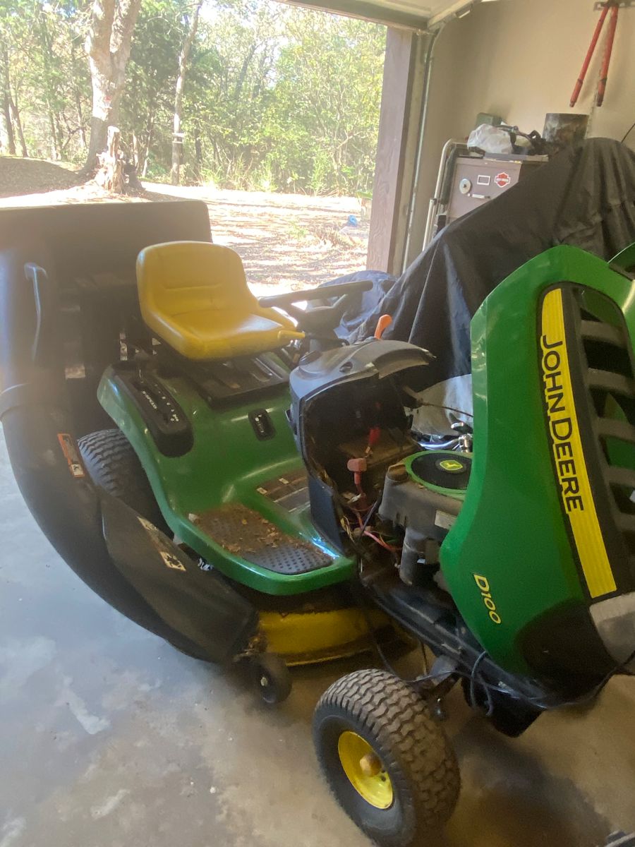 $1000. John Deere D100 tractor  lawnmower. Runs!