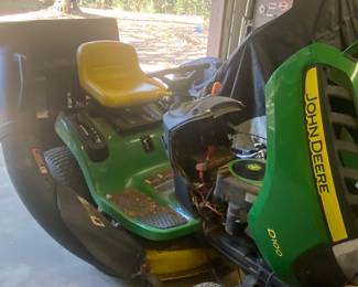 $1000. John Deere D100 tractor  lawnmower. Runs!