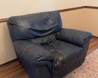 Blue leather side chair with matching ottoman