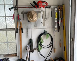 Chain saw, loppers, misc lawn and garden tools, extra large level