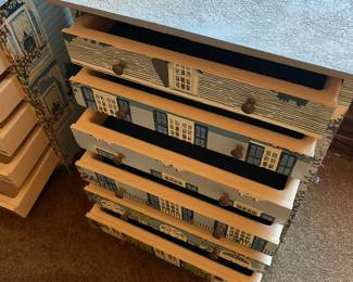 Drawers in this jewelry box are padded navy felt.