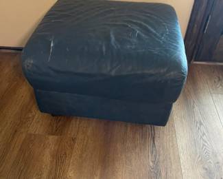 Blue leather ottoman to match sofa