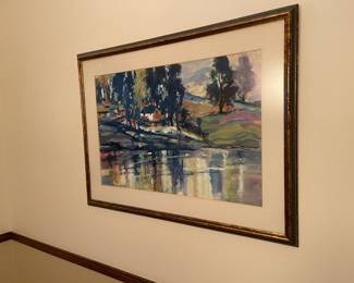 Serene watercolor of house on a lake