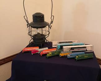 Model train cars (N), metal and plastic. B & O Railroad oil lamp, dozens of great vintage books on railroads across the US. 