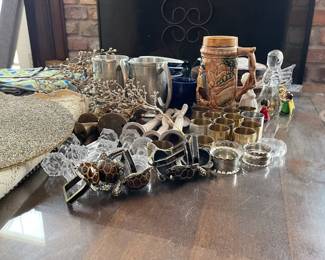 Crystal dirty silver place setting stands, silver beer steins assorted napkin rings.