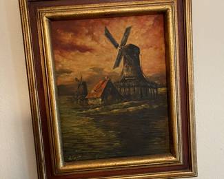 Oil painting of windmill with heavy gold accents