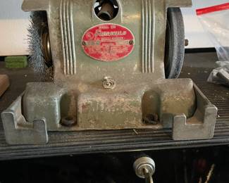Antique Fairchild bench grinder.