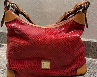 Red alligator Dooney & Burke women's bag with matching coin purse and key chain