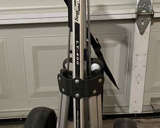 Bag Boy rolling golf caddy.