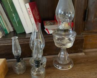 Vintage oil hurricane lanterns in various sizes