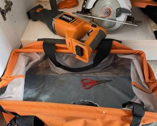 Three piece RIGID set of tools. Cordless drill, circular saw and reciprocating saw with matching carry bag.