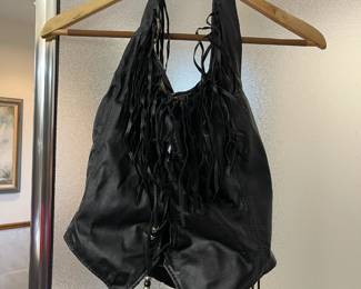 Beaded and fringed leather halter top.