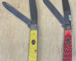 Pair Of Steel Warrior Red And Yellow Handle Trapper Pocket Knives