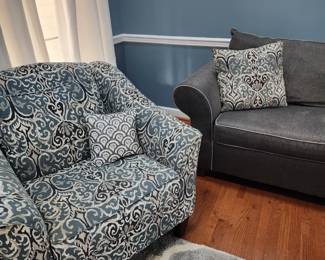There are 2 identical accent chairs for sale in this print!