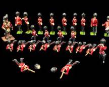 Vintage 25 plus Britain's lead Coldstream British Red Coat Toy Soldiers