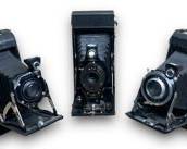 Lot of x3 Vintage Kodak Folding Cameras Including: A Kodak Junior Six-16, A Kodak Six-16, And A Kodak Autographic Brownie No. 2A